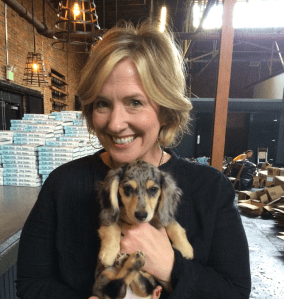 Brown even paused to snuggle shop pup Mary Todd Lincoln, who was along for the ride that morning.