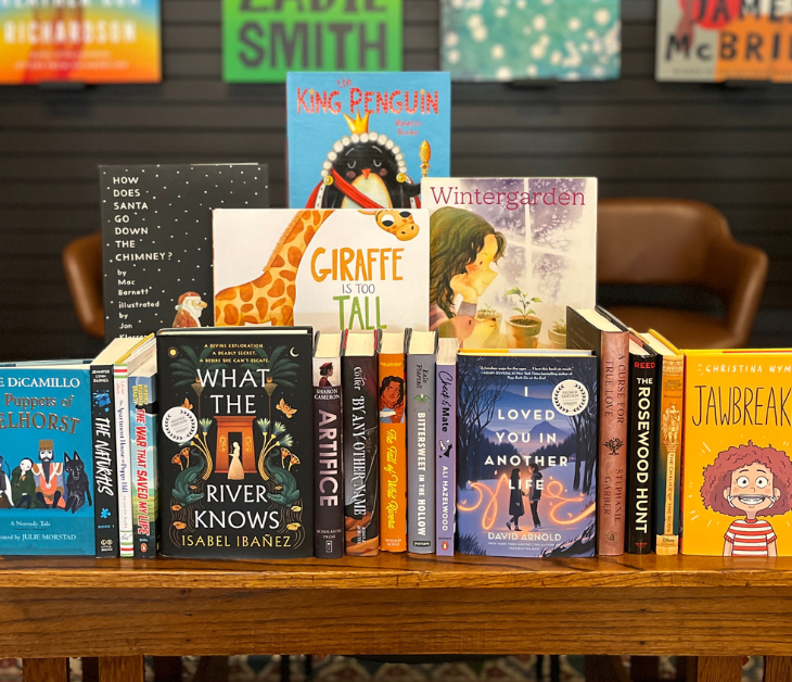 This month's staff recs arranged in a pyramid shape on our stage